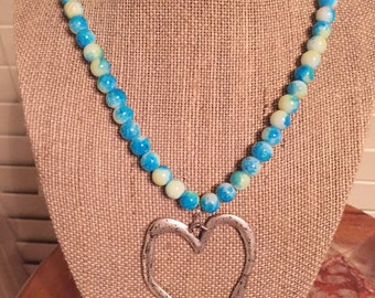 Glass beaded necklace with heart pendant