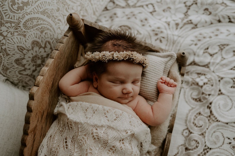 Heirloom Vintage Mohair Wrap with pretty botanical pattern wrapped around newborn baby, asleep in basket. Newborn Photography Prop session.