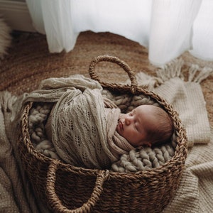 Heirloom Vintage Mohair Wrap with pretty botanical pattern wrapped around newborn baby, asleep in basket. Newborn Photography Prop session.