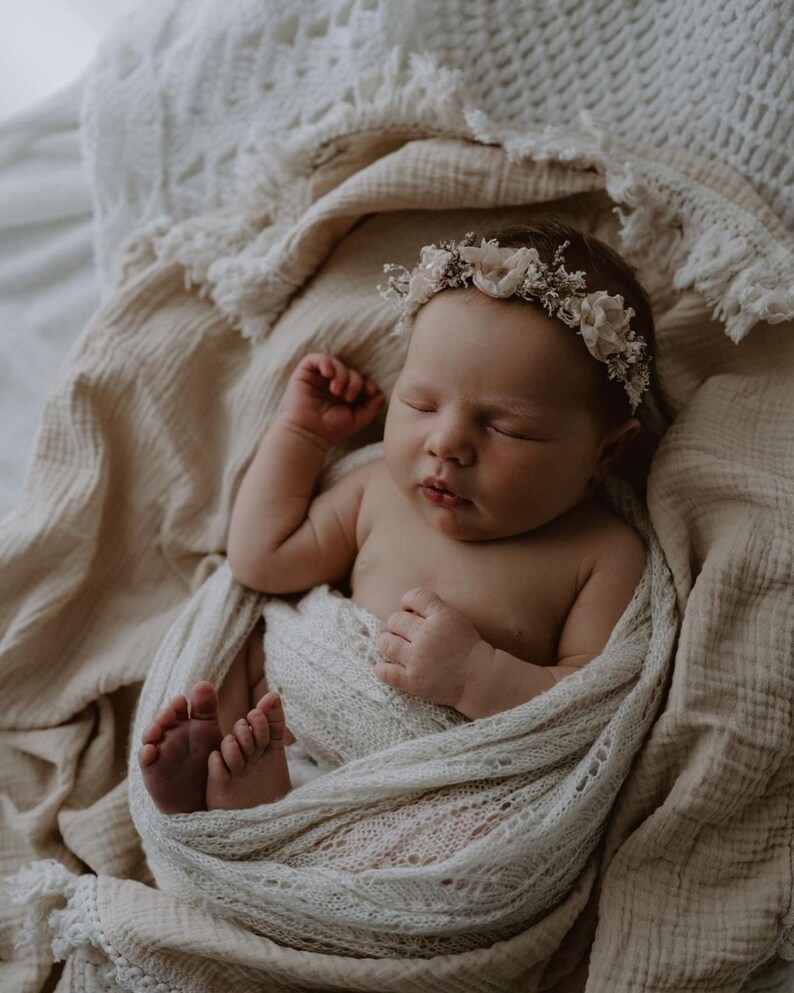 Heirloom Vintage Mohair Wrap with pretty botanical pattern wrapped around newborn baby, asleep in basket. Newborn Photography Prop session.