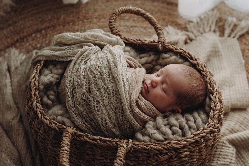 Heirloom Vintage Mohair Wrap with pretty botanical pattern wrapped around newborn baby, asleep in basket. Newborn Photography Prop session.