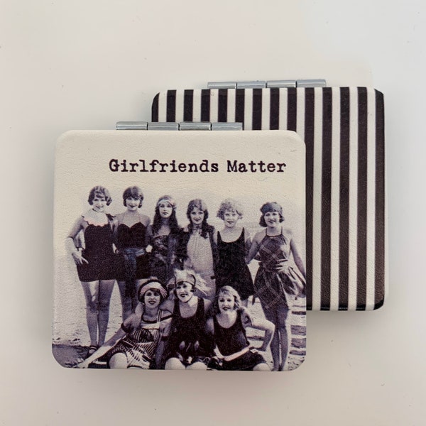 Compact mirror- girlfriends matter beach scene