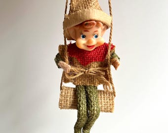 Vintage Pixie Ornament Made in Japan Rubber Face with Burlap Detail Sitting on Swing | 1950s Christmas Holiday Decor | Vintage Kitsch