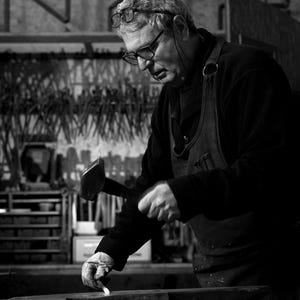 Hand-Forged Iron Swan Sculpture: Rustic Blacksmith Decor