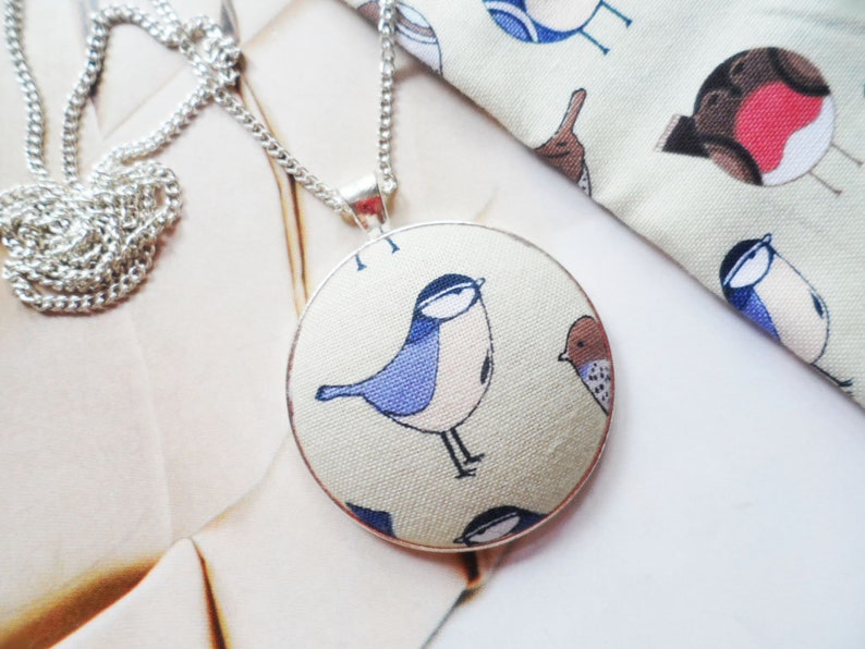 Scandinavian bird necklace with a cotton fabric pendant and silver plated chain Selma Dreams