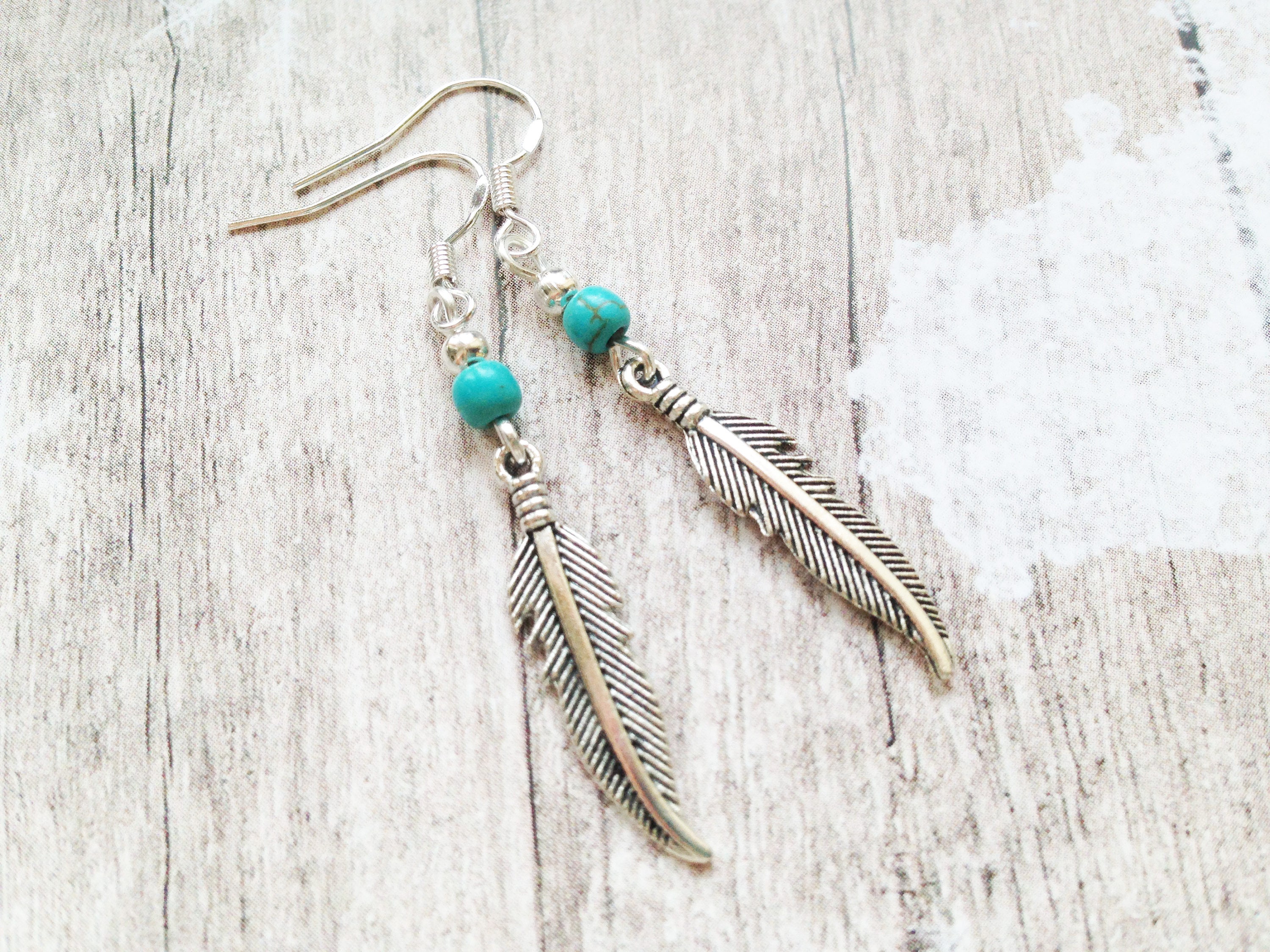 Silver feather sale earrings with turquoise
