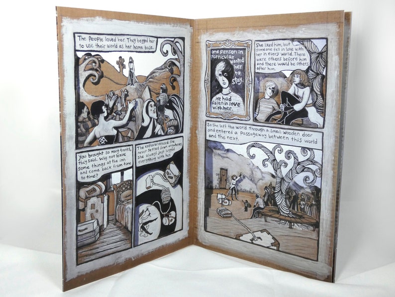 May include: A black and white comic book illustration depicting a woman with long dark hair standing in a landscape with mountains and a small town. The text reads "The People loved her. They begged her to use their world as her home base." and "You brought so many things. They said. Why not leave some things at the inn and come back from time to time?"