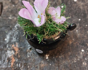 Bicycle bell with flowers on artificial turf reserved for Monika