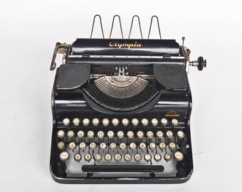 Antique Olympia Progress Typewriter / Black