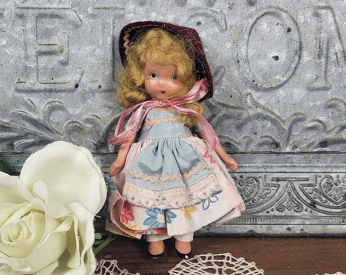 Antique Bisque Nancy Ann Storybook (NASB) Doll -with Flower Print Dress