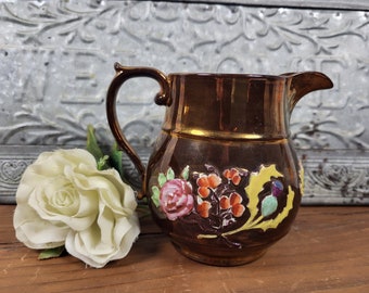 Antique Bronze-Copper Pitcher with Raised Floral Design
