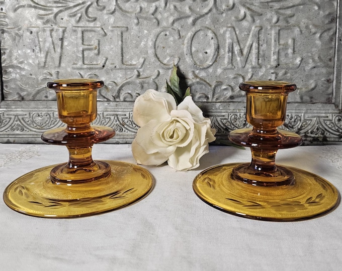 Pair of MCM Amber Single Light Candlesticks | by Diamond Glass
