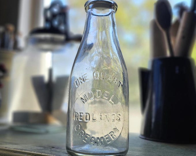 1920s Redlands Model Creamery One Quart Milk Bottle with Unusual Paper Lid