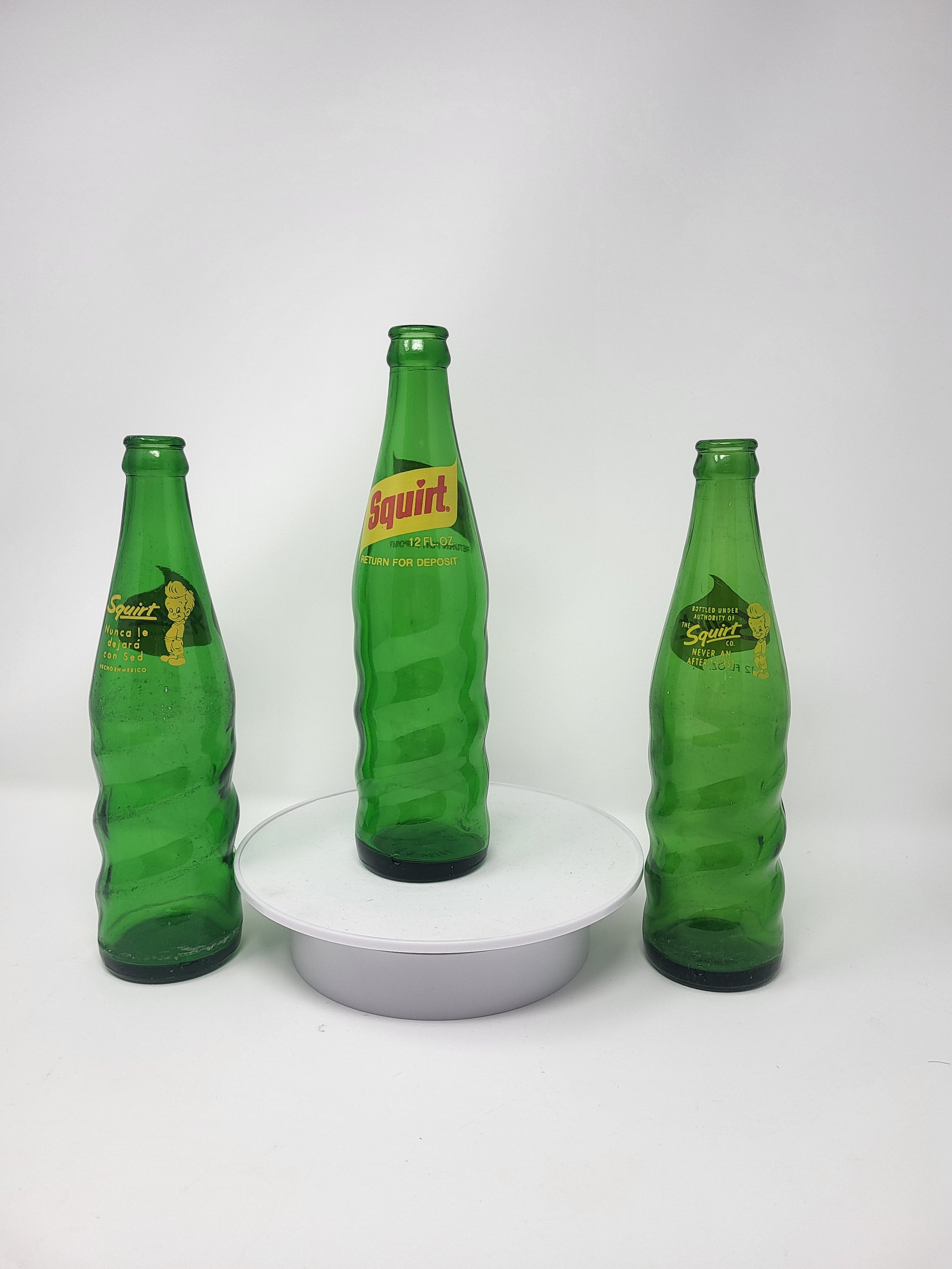 Green soda bottle deals