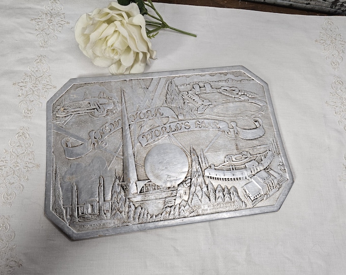 1939 New York World’s Fair Aluminum and Cardboard Trivet