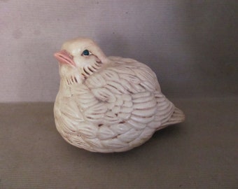 A gift for a lover of antiques A figurine on a chest of drawers or on a fireplace Vintage plaster bird on a twig Antique bird.