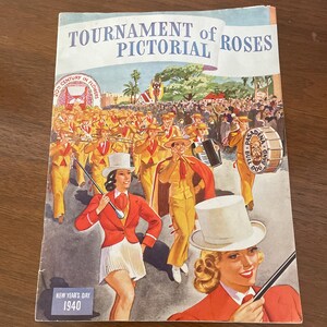 May include: Vintage magazine cover titled "Tournament of Pictorial Roses" featuring a parade scene with marching band members in yellow uniforms and women in red jackets. The cover reads "New Year's Day 1940".