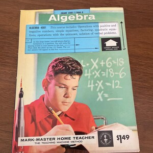 May include: A vintage Mark-Master Home Teacher Algebra educational booklet for grade levels 7 through 9. The cover features a person in a red shirt writing with a pencil, a rocket model, and a green chalkboard with handwritten algebra equations.
