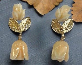 1950s Carved Angel Skin Coral Earrings: 14k Gold Leaves
