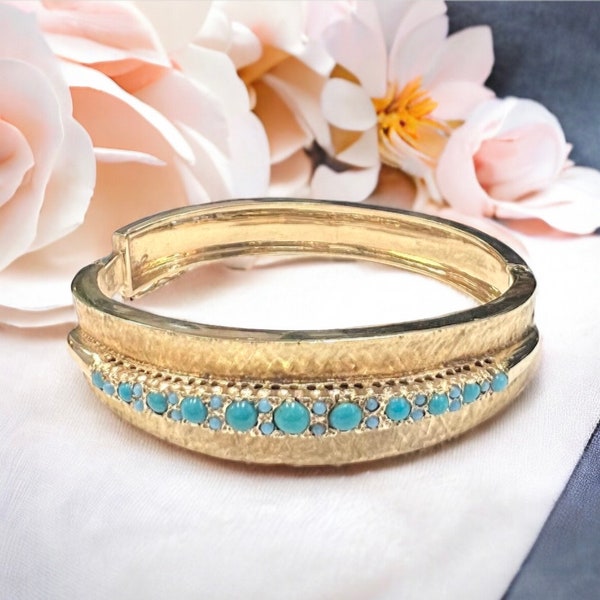 Vintage 1970s Bangle with Turquoise stones in 14 karat yellow gold