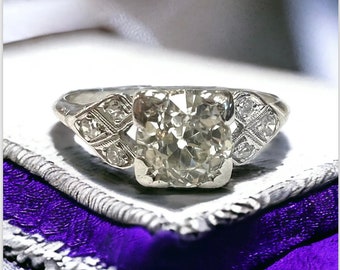 1930s Art Deco 0.70 Ct Old European Cut Diamond Engagement Ring with Diamond Accents in Platinum