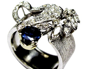 LACKRITZ Platinum Ring set With Multi Assorted Genuine Diamonds and 0.67 CT Genuine Round Medium Blue Sapphire.