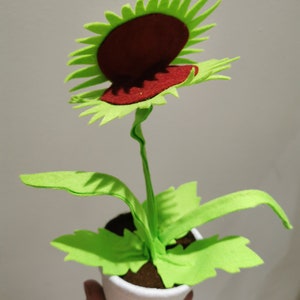 Faux Venus Flytrap plant in a pot.