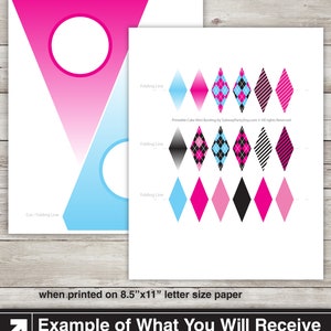 May include: Printable cake bunting with pink, blue, black and white diamond shapes. The bunting is designed to be cut out and assembled. The text "Printable Cake Mini Bunting by SubwayParty Etsy.com All rights Reserved" is included on the image.