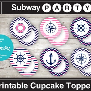 May include: Printable cupcake toppers with a nautical theme. The toppers feature pink and blue stripes, chevron patterns, and nautical icons like a life preserver, anchor, compass, and ship's wheel.