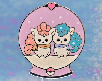 Pin esmaltado de zorros de nieve