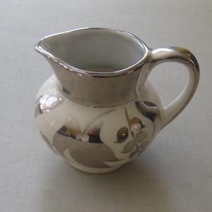 Sweet luster Sandland ware pitcher