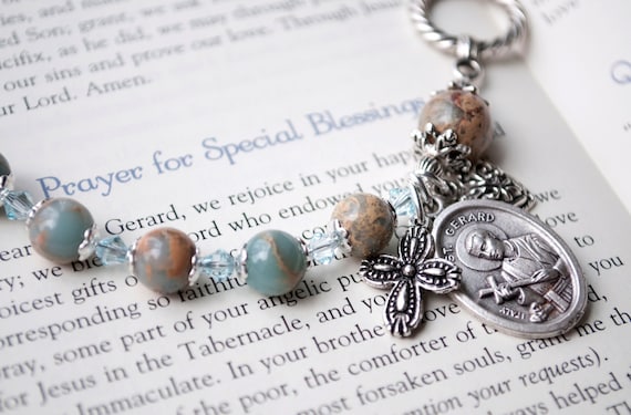 7 1/2 Inch December Birth Month Bead Rosary Bracelet with Patron Saint Petite Charm 7 1/2 Inch December Birth Month Bead Rosary Bracelet with Patron Saint Petite Charm