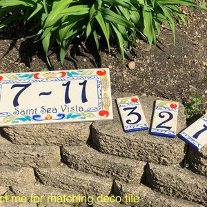 Italian ceramic house number plaque in an 8x16” size along with matching 3x6” individual decorative tiles.
