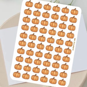 May include: A sheet of stickers with numerous cartoon pumpkins in orange and brown. The stickers are arranged on a white background. The stickers are on a white background. The stickers are on a white background.