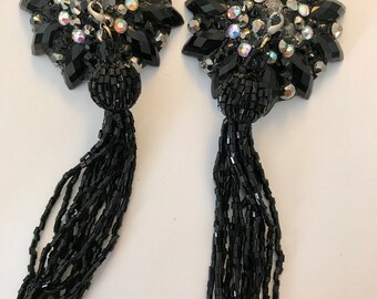 Black pasties with black beaded tassel