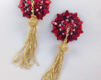 Ruby red pasties with gold tassel