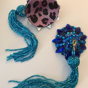 Blue pasties with blue tassels