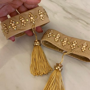 Arm bracelets with tassel