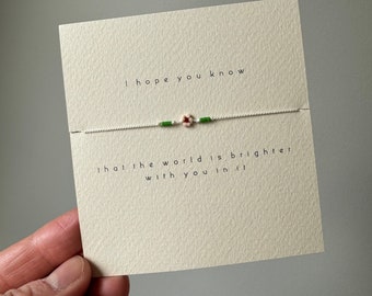 Valentine’s Day Flower Friendship Bracelet on white silk - the world is brighter with you in it