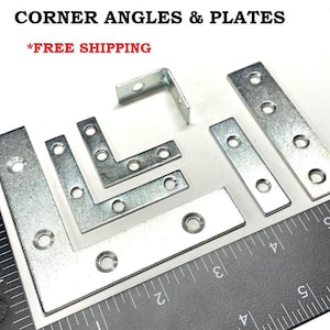 May include: A set of silver metal corner angles and plates with pre-drilled holes. The angles and plates are arranged on a black ruler with inch markings. The text "CORNER ANGLES & PLATES" and "*FREE SHIPPING" is visible at the top of the image.
