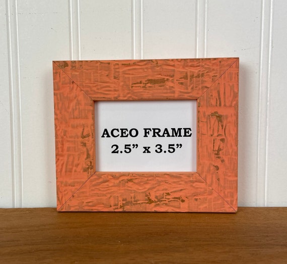 How to Make Easels For Your Picture Frames Out Of A Wire Hanger