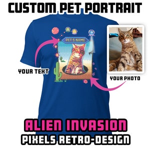 May include: A blue t-shirt with a pixelated design of a cat in a spaceship. The design includes the text "PET'S NAME" and "ALIEN INVASION PIXELS RETRO-DESIGN".