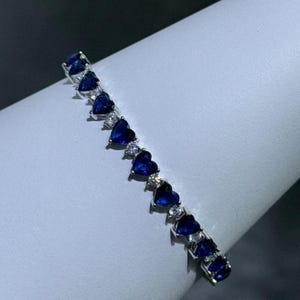 Platinum Sterling Silver Blue Sapphire Heart Shape Classic Tennis Bracelet 7&quot; L