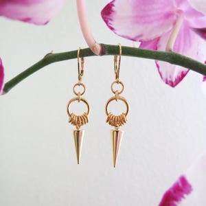 Delicate gold plated spikes dangle earrings // ICA image 1