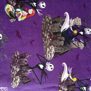 May include: Purple fabric with a repeating pattern of Jack Skellington and Sally from the Nightmare Before Christmas. The characters are depicted in a spooky Halloween setting with a graveyard and a haunted house.
