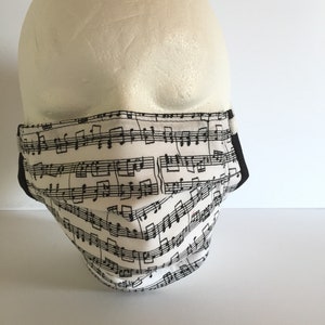 Ansiktsmask med musikpartitur: Trelagers bomullstyg, justerbar passform