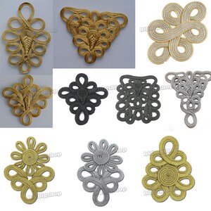 May include: Assortment of decorative Chinese knot buttons in gold, silver, and black. The knots are in various shapes, including square, triangle, and flower.
