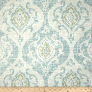 May include: A blue and white fabric with a damask pattern. The fabric has a subtle green and white floral design within the damask pattern.
