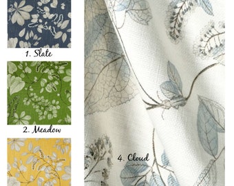 May include: Fabric samples in four colors: Slate, Meadow, Citrine, and Cloud. The fabric features a botanical design with leaves and branches. The style is Becca Arboretum, made of 100% cotton basketweave, 8 oz.