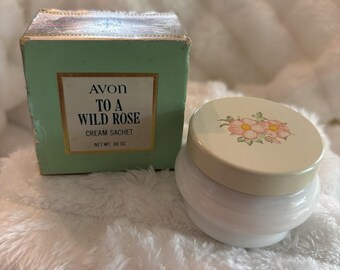 Frasco miniatura de crema To A Wild Rose de Avon vintage con caja.